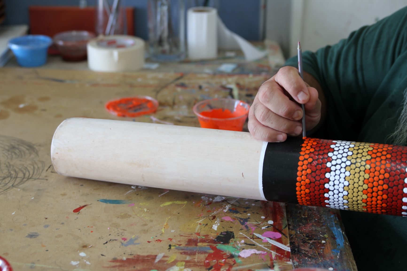 An inmate painting at Girrawaa Creative Work Centre