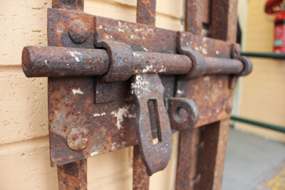 Photo of heavy steel bolts for cell security - circa 1890s